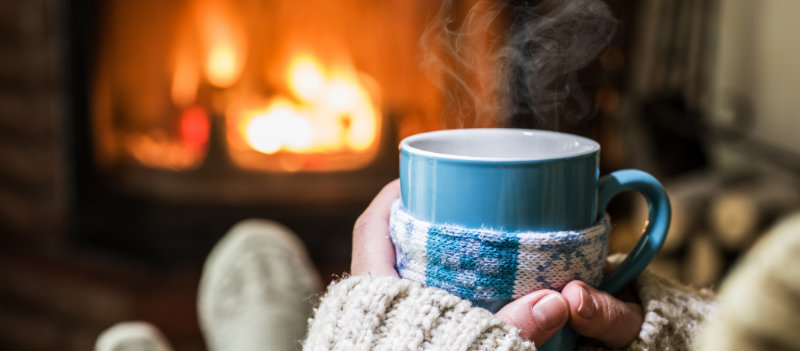 Burns first aid steps - hot drink in front of the fire